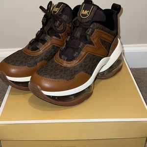 Michael Kors Olympia Extrême Logo and Leather Trainer, gently used.